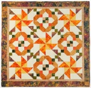 free quilt pattern - GO! Qube 6 Spinner Squares Wall Hanging Quillt by AccuQuilt