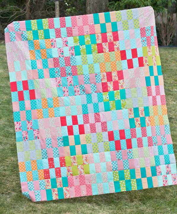 free quilt tutorial Jelly Strip Stash Buster Quilt by cluck cluck sew