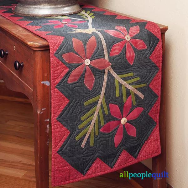 Poinsettia and Pine - free quilt pattern